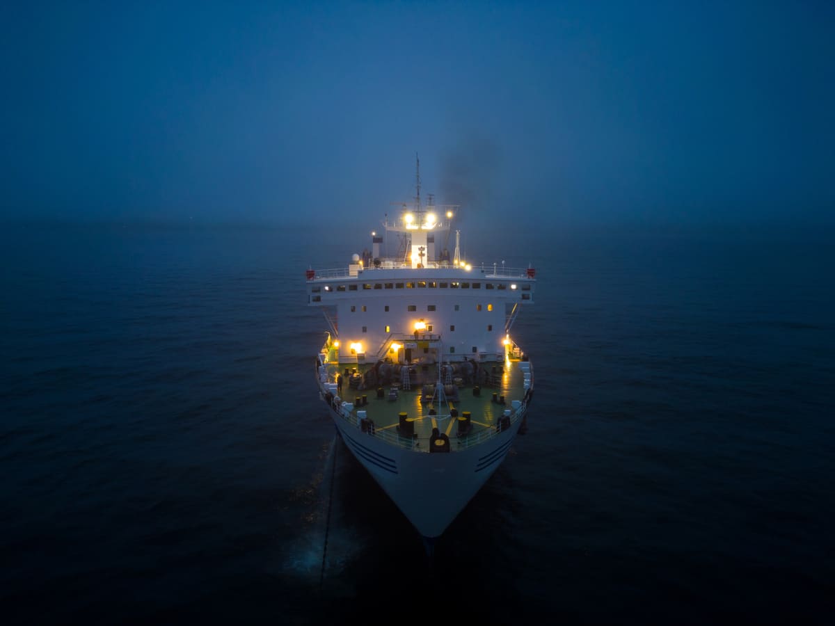 ferryboat navigating through fog