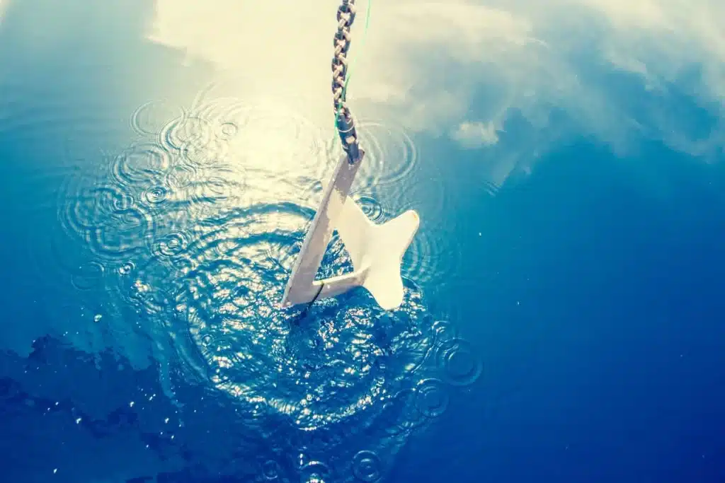 A boat anchor being drop in the water